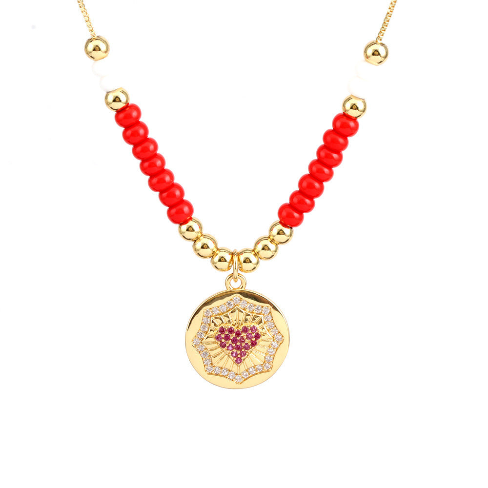 Collar con colgante de ojo mágico en forma de corazón de cobre al por mayor